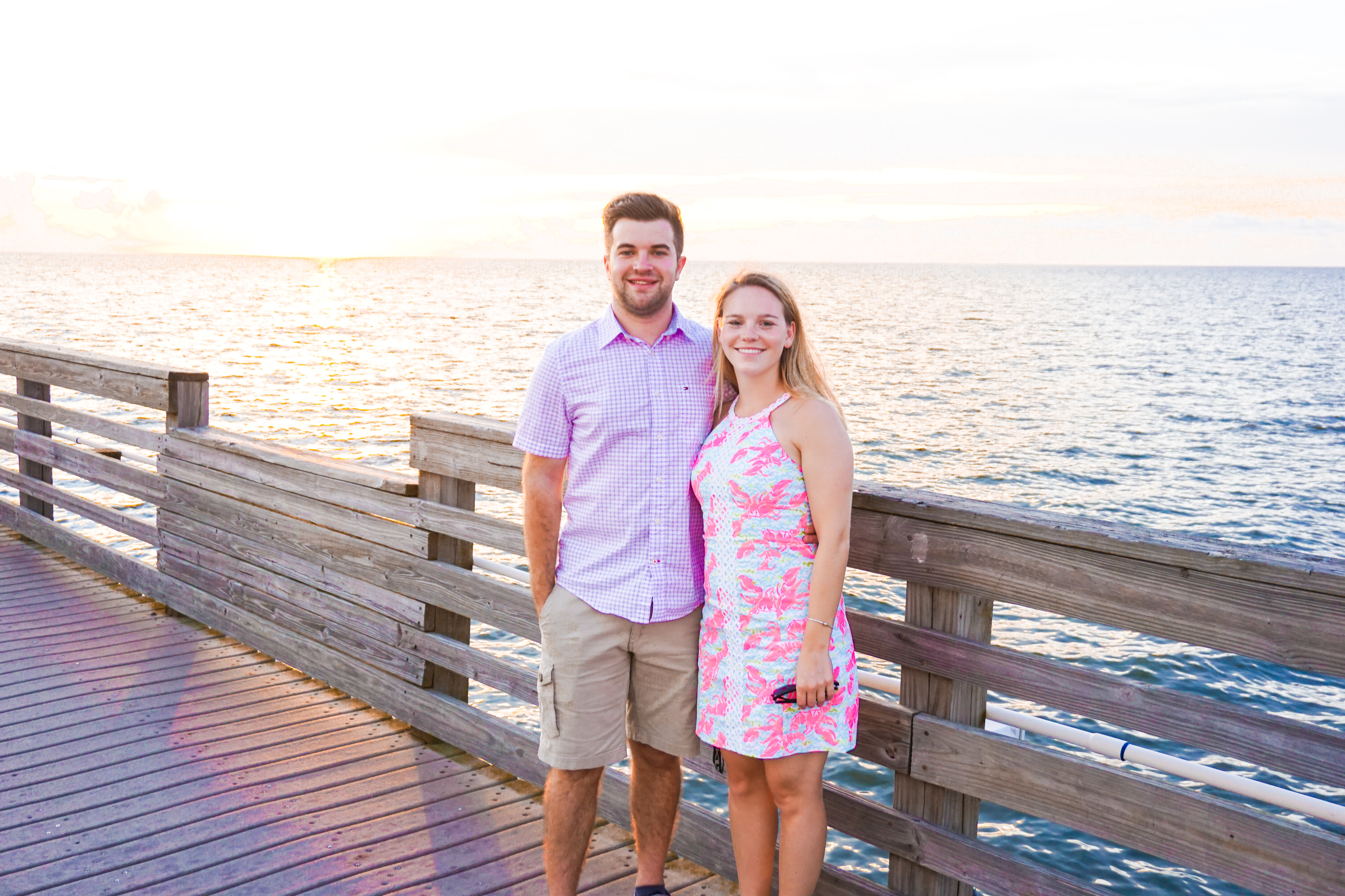 couple with sun setting in the background