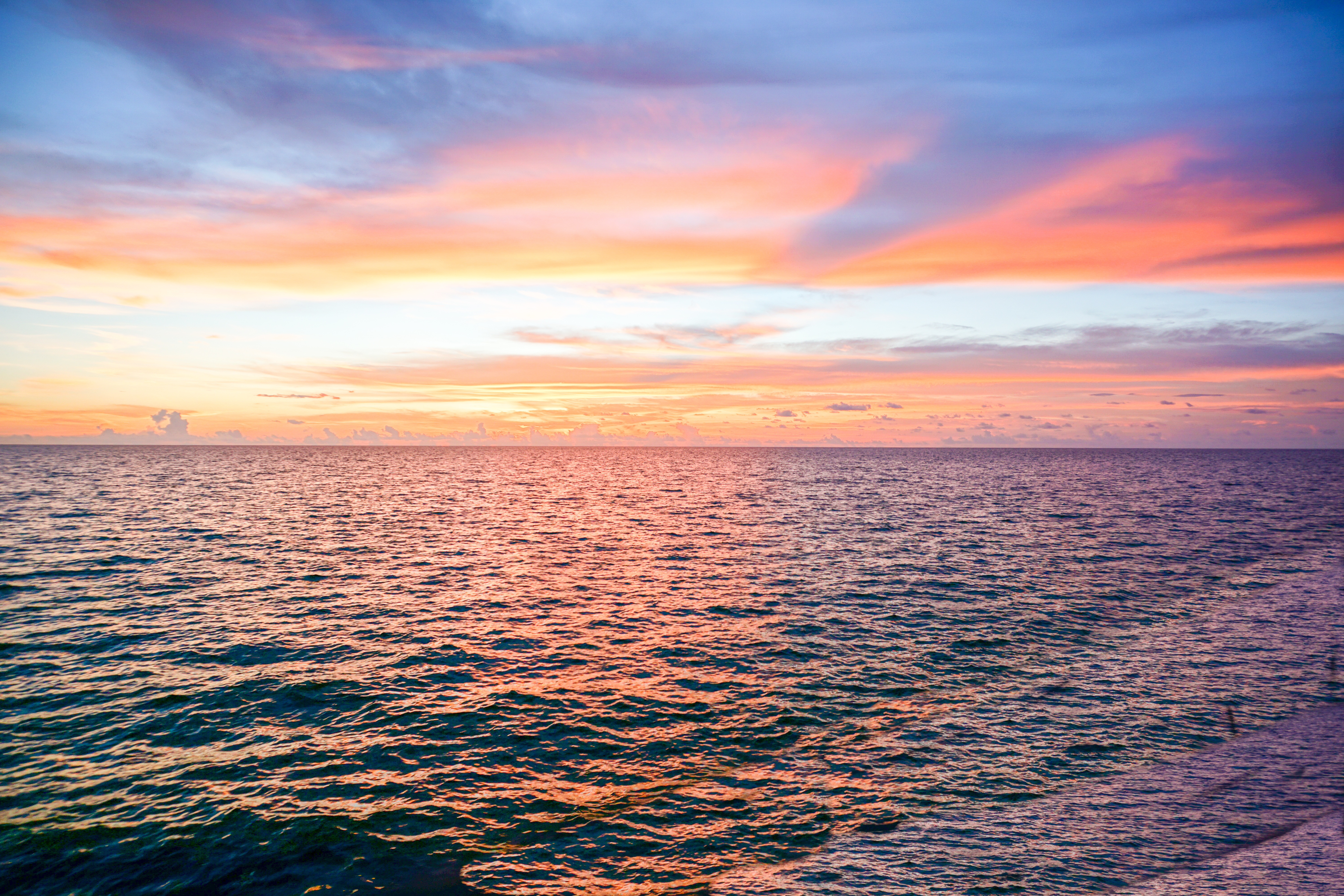 orange yellow and blue sunset