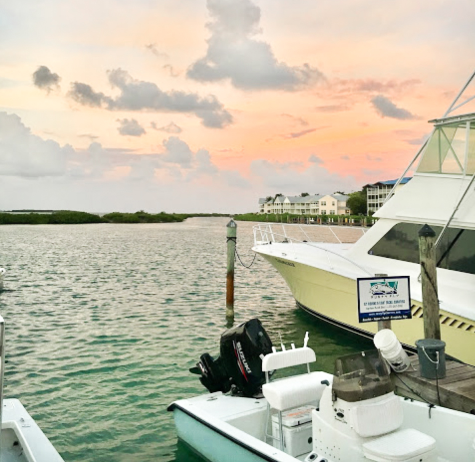 beautiful sunset with fishing boat at Hawks Cay Resort