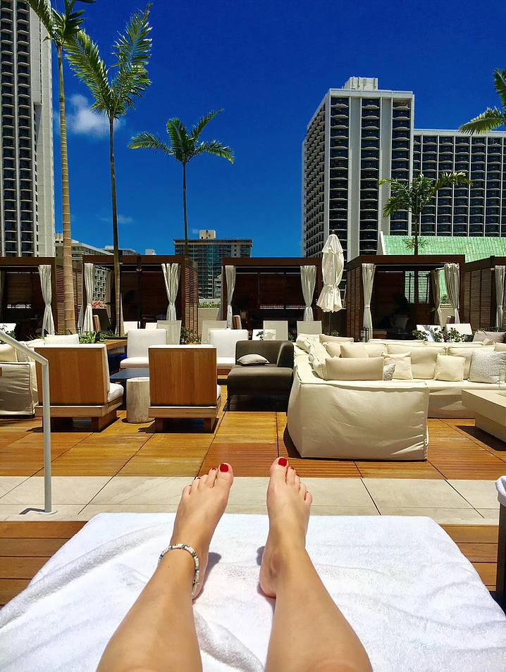 the pool area was equipped with cabanas, a bar, fire pits, a hot tub, an infinity pool, and plenty of seating 