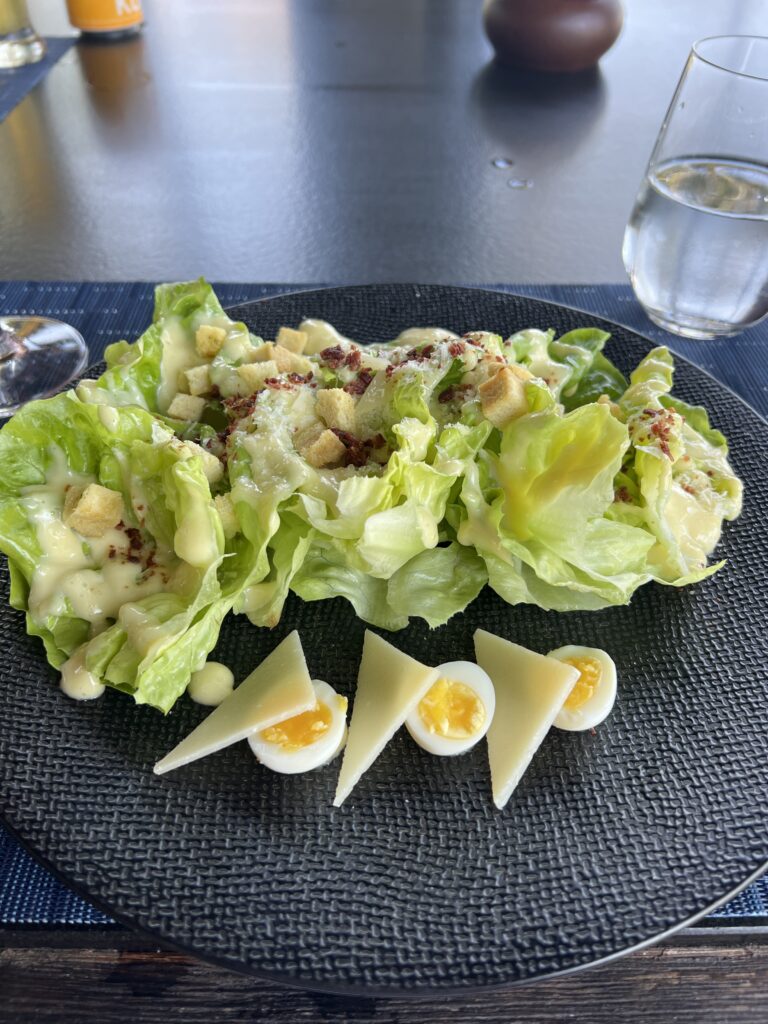 Caesar salad at The Beach Grill featuring quail eggs