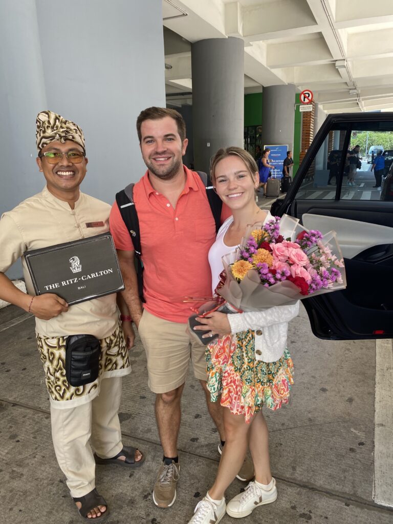 our greeter who was holding up the sign for the Ritz Carlton Bali to take us to the resort